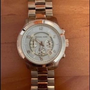 Gold large faced Michael Kors watch